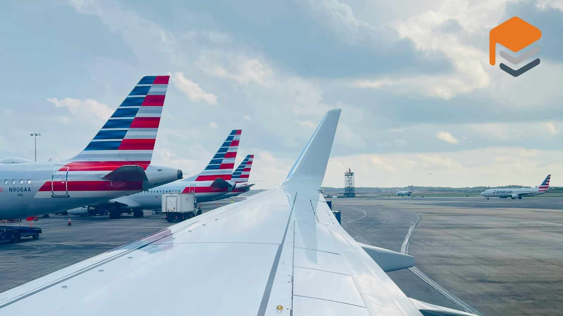 Airplanes parked at airport terminal