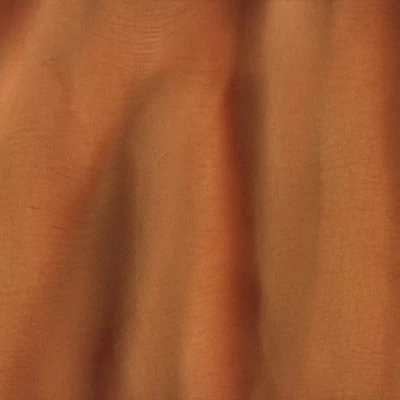 Close-up of textured brown fabric background.
