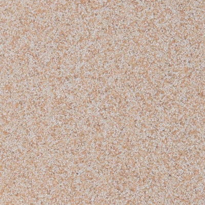 Close-up of textured speckled beige surface