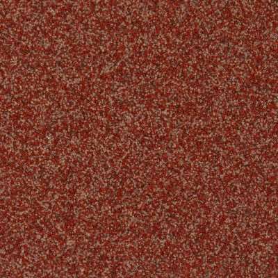 Close-up of coarse red sandpaper texture.