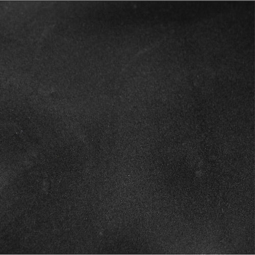 Dark textured background with subtle variations.