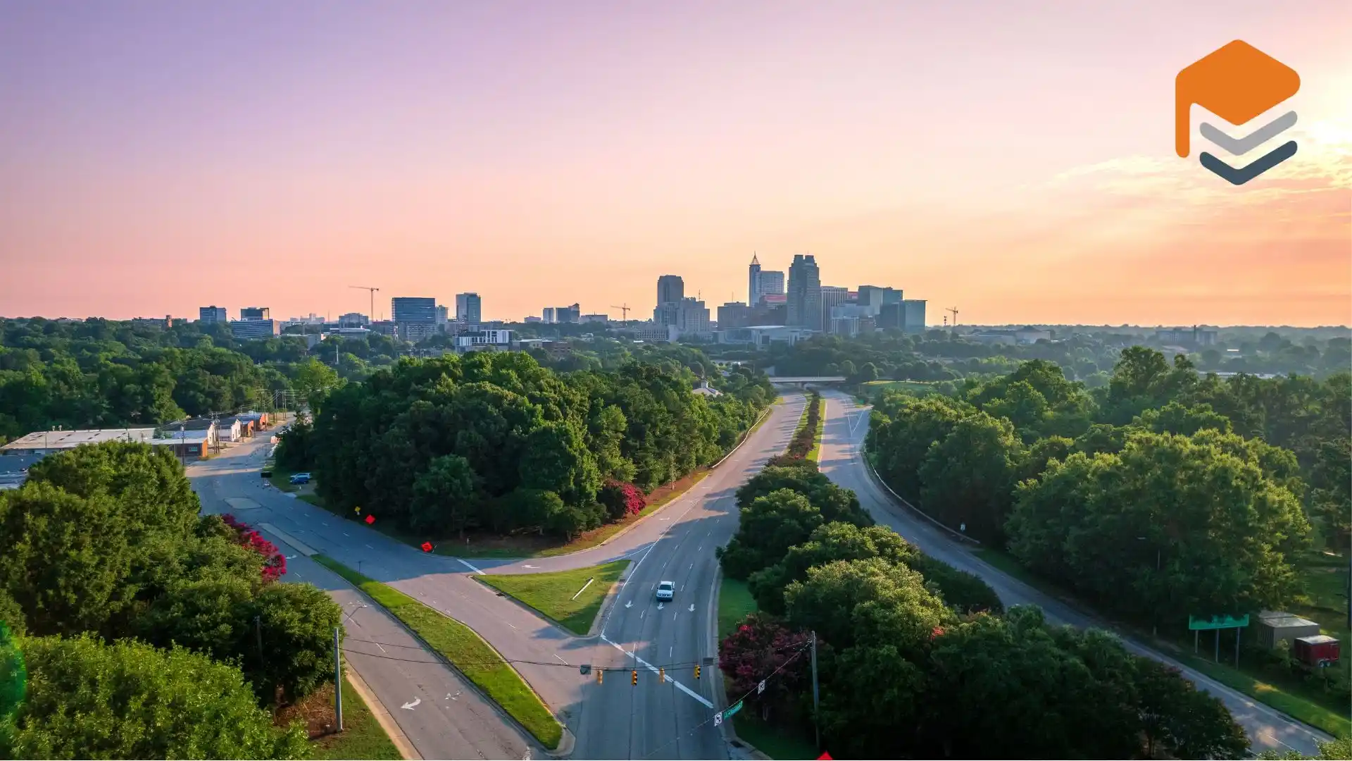 Downtown Raleigh, North Carolina at sunrise, where many commercial businesses require concrete coatings.