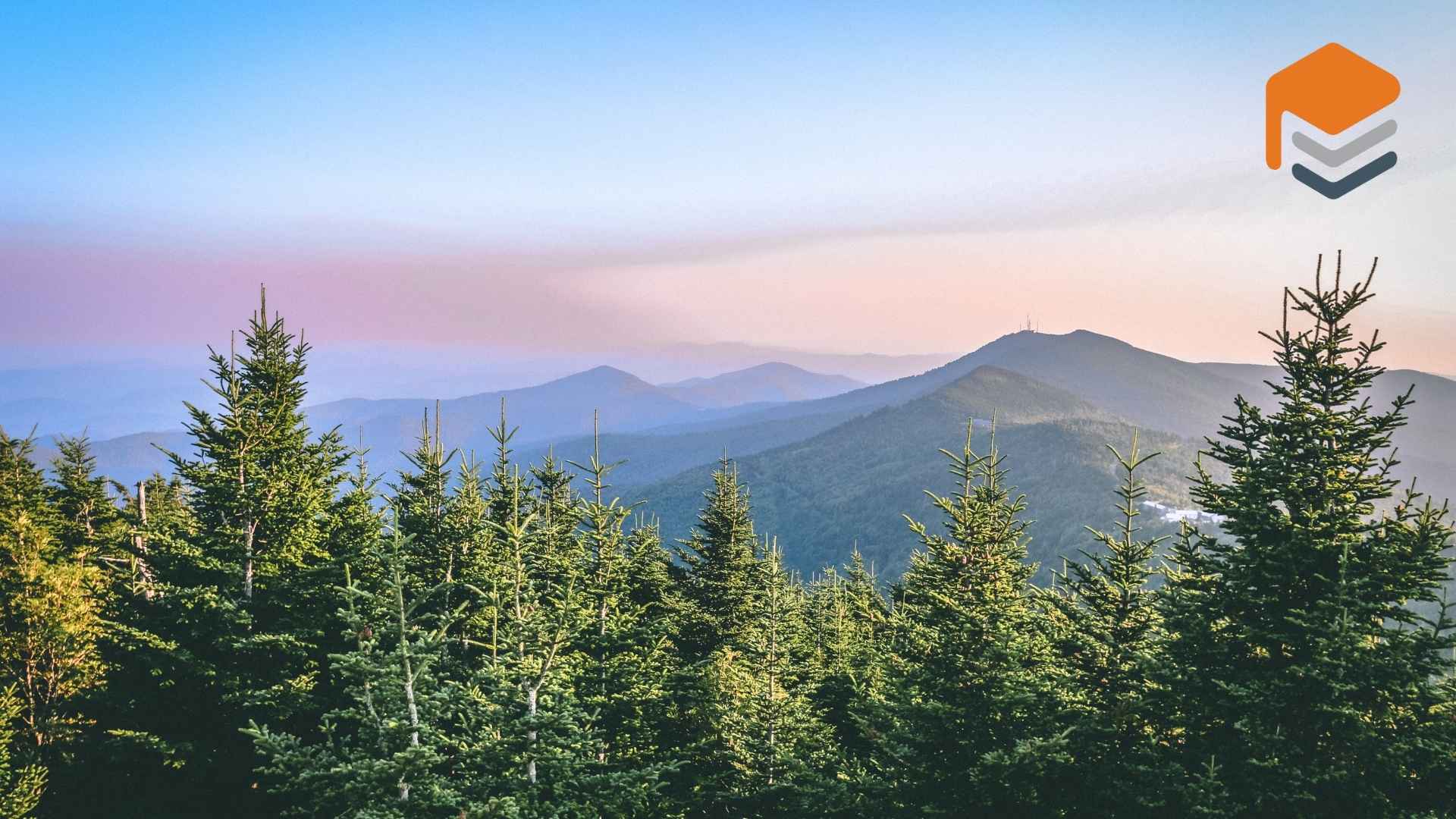 A scenic view of the mountains and trees in north carolina, where is there is a need for garage floor concrete coatings.
